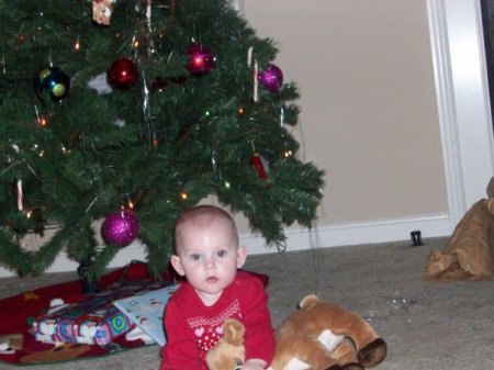 Taylor in front of her first Christmas Tree.