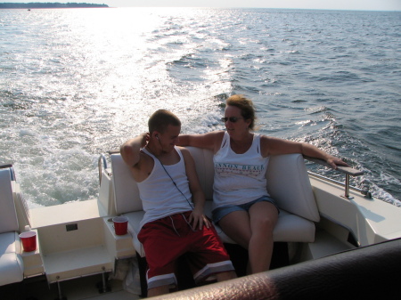 Wife and son on our boat