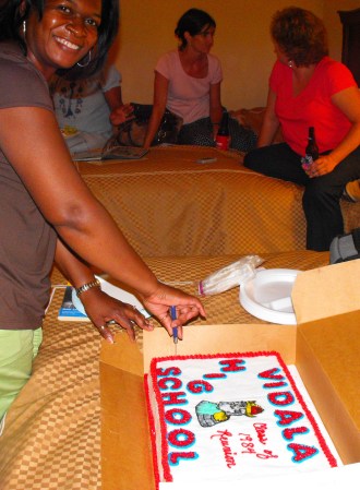 Beverly, cutting the reunion cake