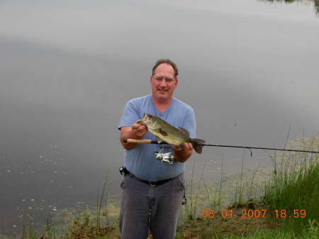 My husband fishing on his Dad's farm.