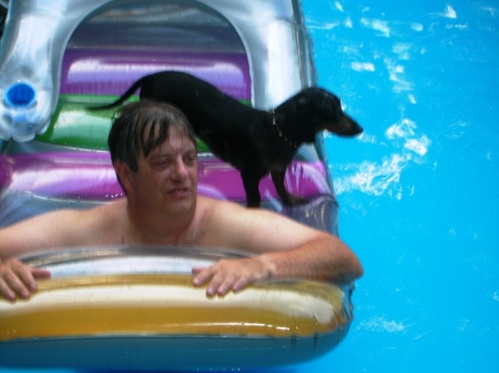 Playing in the pool with Pepper, my dachshound
