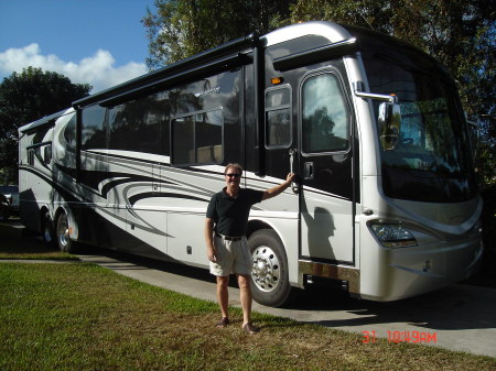 JOHN WITH RV 12 2008 AT HOME IN DRIVEWAY