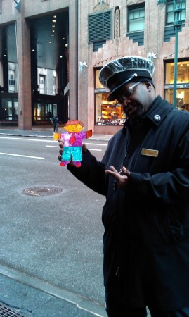 Flat stanley with our door man at the hilton