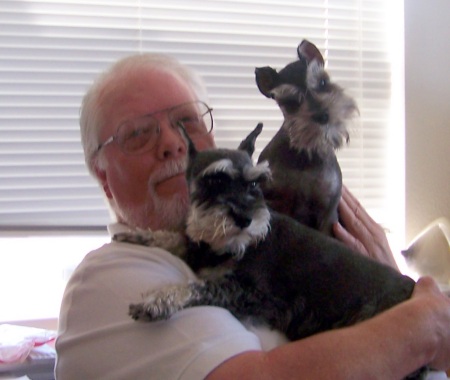 My husband Keith and our Schnauzers