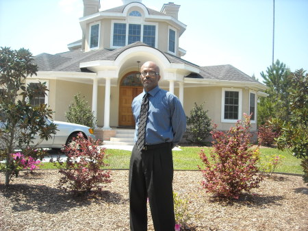 Wayne in front of my parents house. 4/12/09