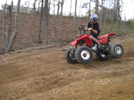 tyler plaing on his 4 wheeler