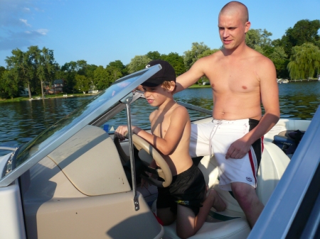 My son Joe and his son, Drake out on the boat