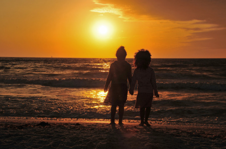 Silhouettes In The Setting Sun