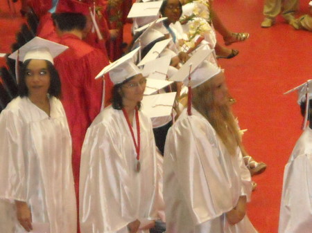Shannon walking up to  get diploma