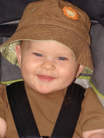 noah in the swing at the park