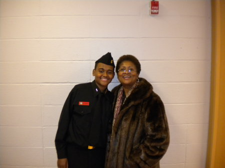 with grandson at a Navy ROTC program.