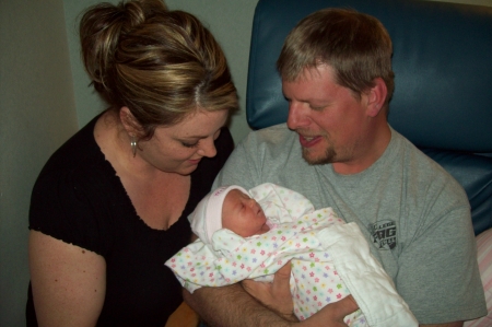 Grandpa holding Charlie first time