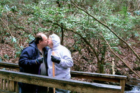 Kissing on swinging bridge