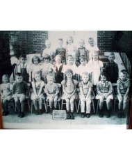 Kindergarten, I am 3rd from the left in row 1