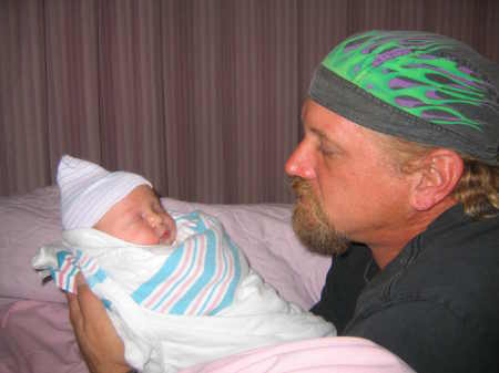 My husband, Curtis holding Bradly