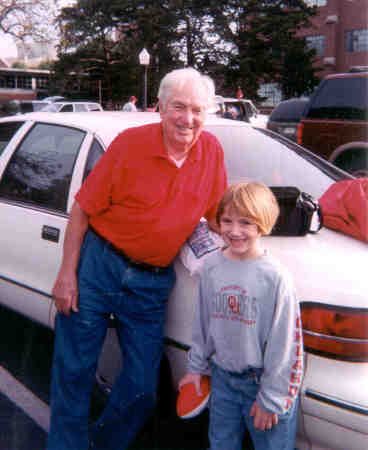 Dad with Katie late 90's at OU Football Game