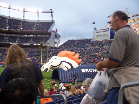 my wfe and i at a broncos game