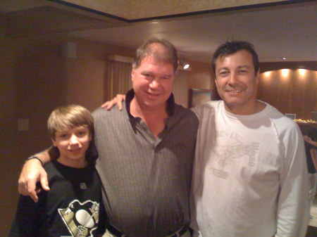 Greg Hunter,son and I in his house