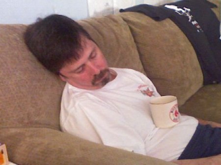 My hubby asleep with his tea