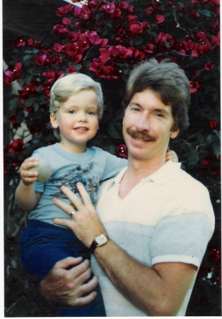 Jason and Dad 1986 in front of Grandpa/Grandma