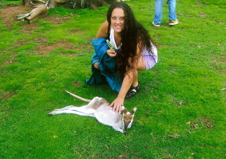 Petting a baby wallaby in Australia