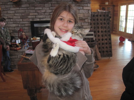 Brooke and one of her many cats.