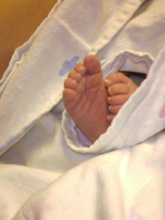 Alina's tiny feet 1 3/4 inches long