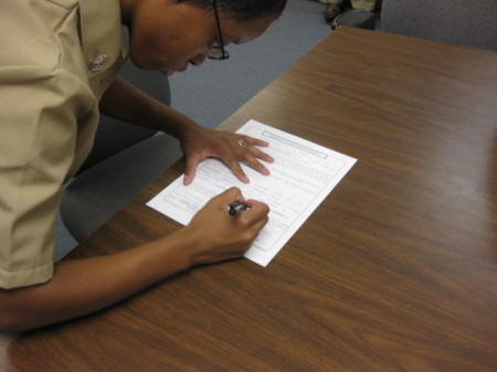 SIGNING OF THE ENLISTMENT PAPERS