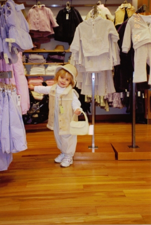 Piper, age 2, loved clothing at an early age!