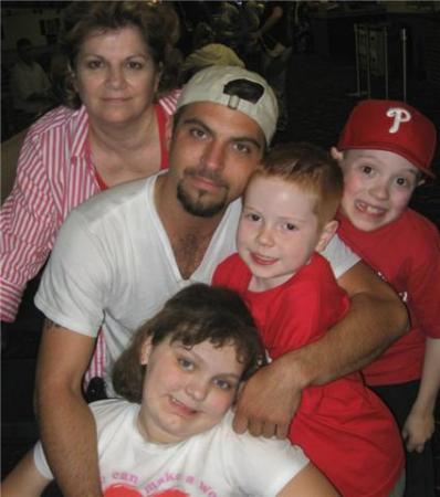 Me, my son Tom and some of my grandkids 2009