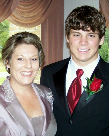 MOTHER AND SON AT WEDDING