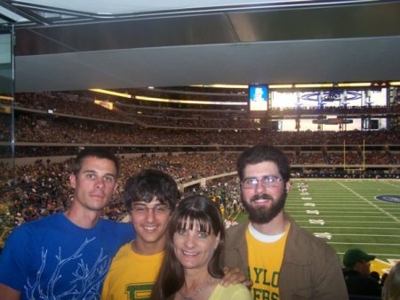 Me with my 3 sons at The Cowboys Stadium.