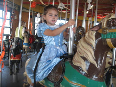 Mia on the carousel in Newport!