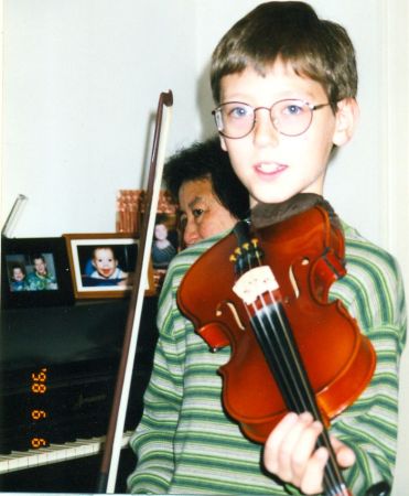 Sam with violin 1997