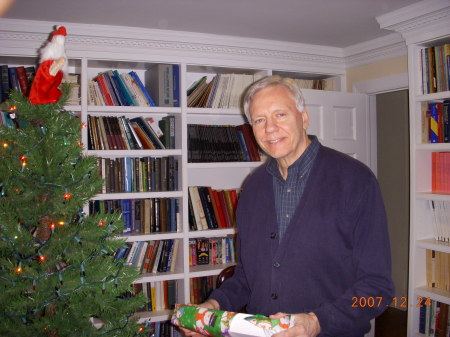 Jack in his library, holding a present, 2007.
