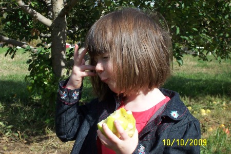 Emily Picking Apples