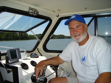 JB at the helm of his Bay Boat