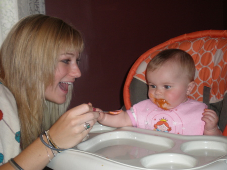 Catherine feeding Brianna my granddaughter