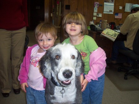 my 2 granddaughters with a friend'ss dog