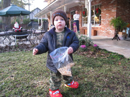 Keaton putting out reindeer food.