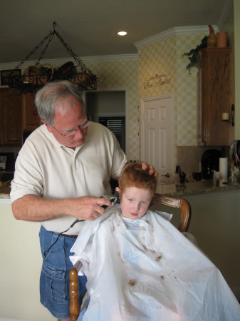 John giving Jack a haircut