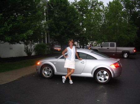 Nancy by her car