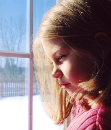 Caity looking at the snow.