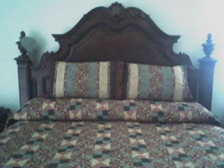 Mom's bed made quilt and pillow sham