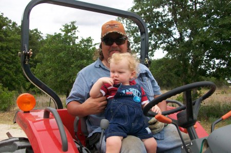 Lane & Grandpa Bruce on the tractor