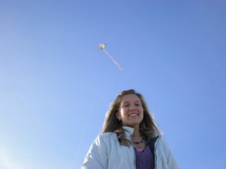 Terah flying kite on Oregon Coast