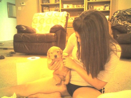 Brittney and baby golden retriever