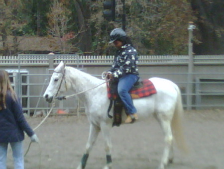 Sage at weekly horse riding lessons