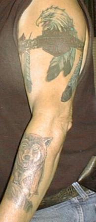 Left arm wolf & eagle tattoo