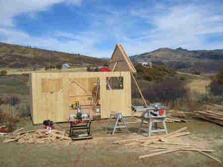 Ron building barn in Steamboat Springs